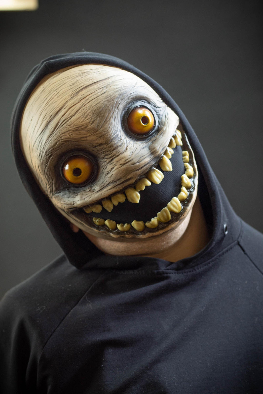 Crazy smile mask with yellow eyes for Halloween or a funny gift