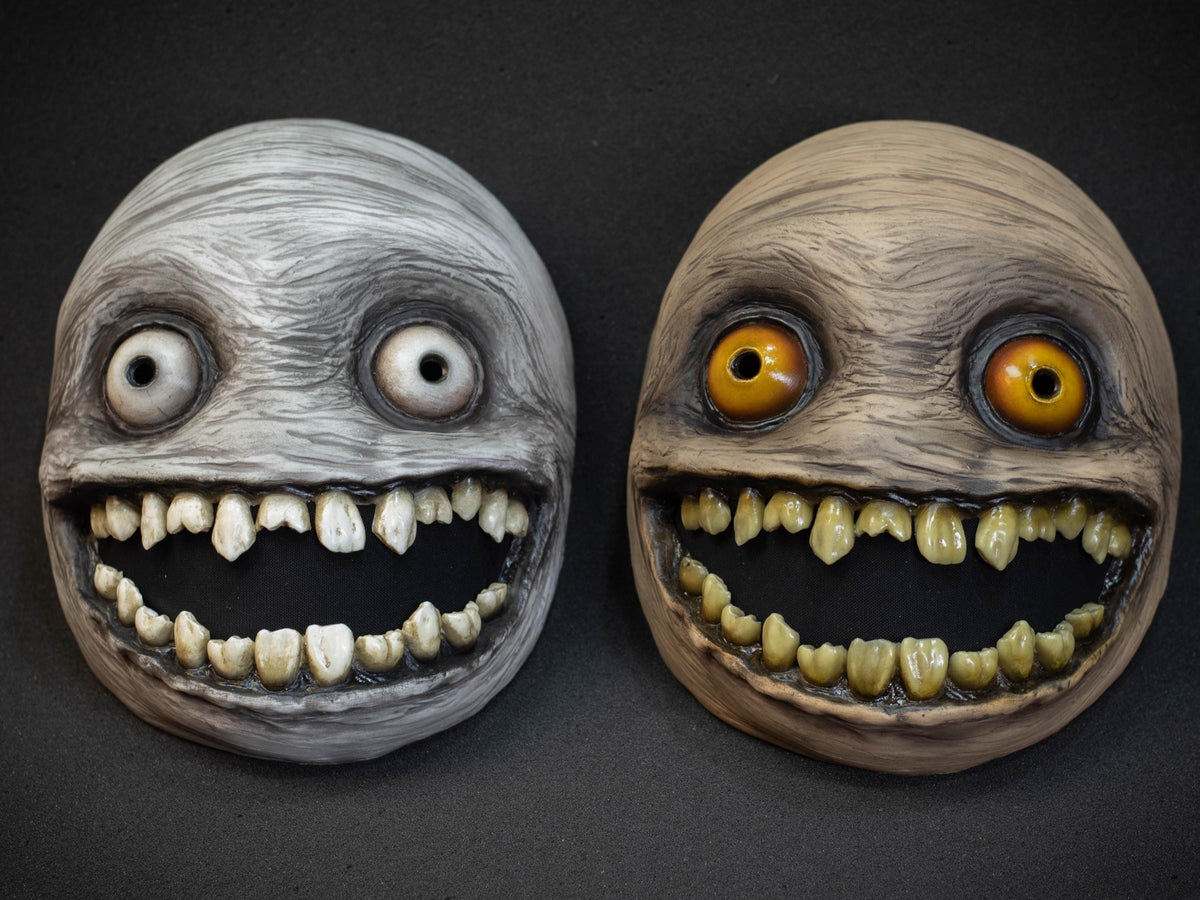 Crazy smile mask with yellow eyes for Halloween or a funny gift
