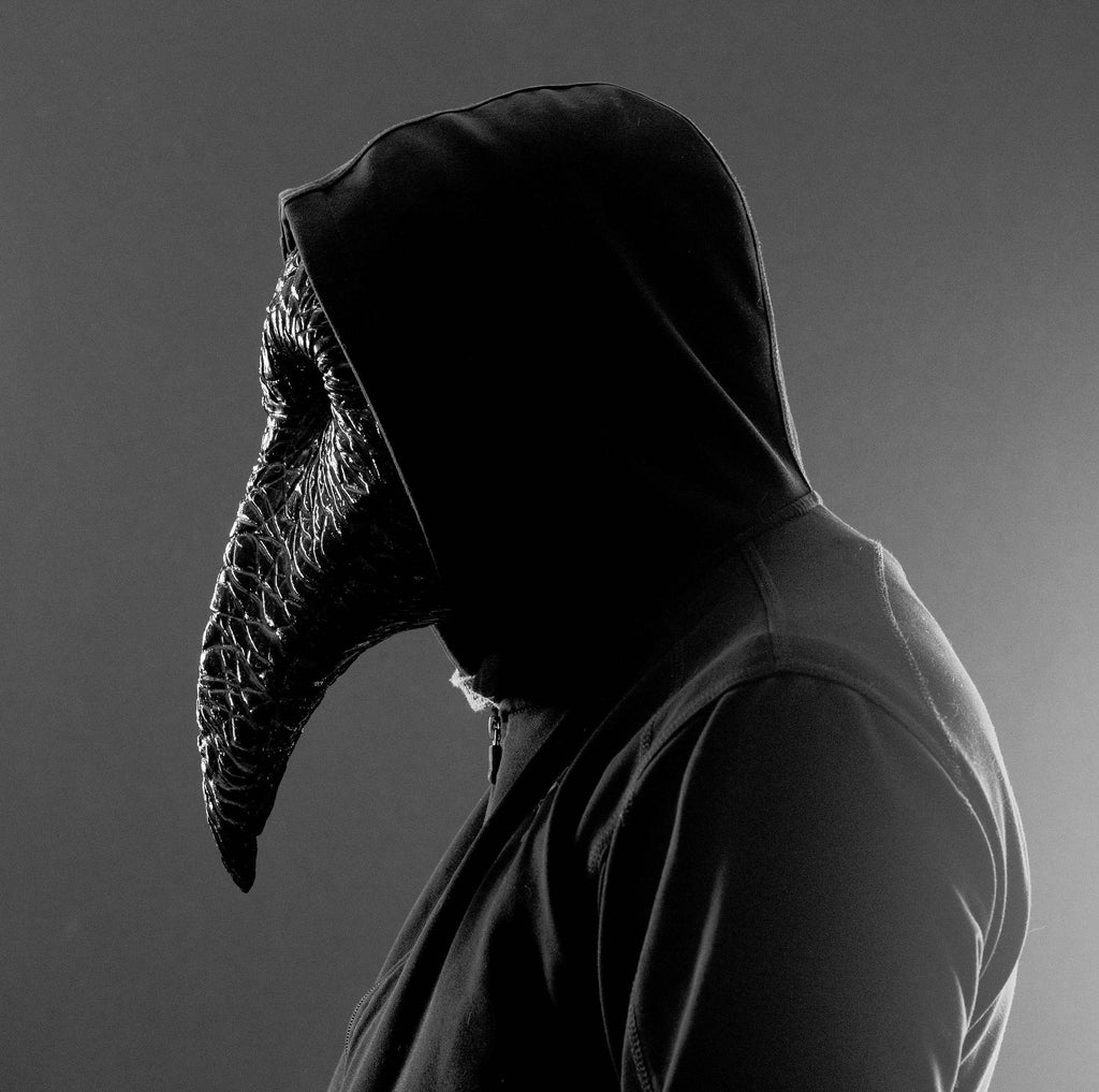 Plague Doctor mask for Helloween party and carnival or masquerade. Bird mask metallic shape.