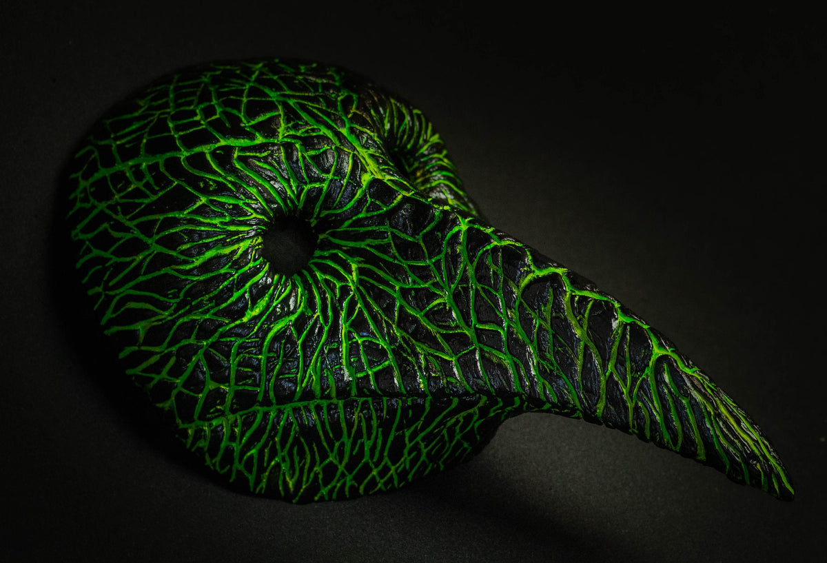 Plague Doctor mask for Helloween party and carnival or masquerade. Predator blood acid streaks shape.