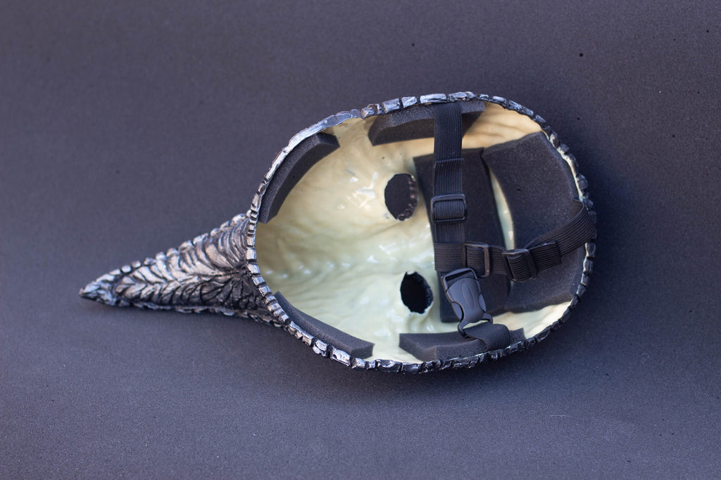 Plague Doctor mask for Helloween party and carnival or masquerade. Bird mask metallic shape.