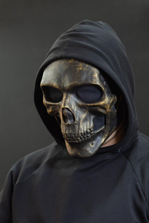 Black skull mask with gold scuffs for cosplay or gift