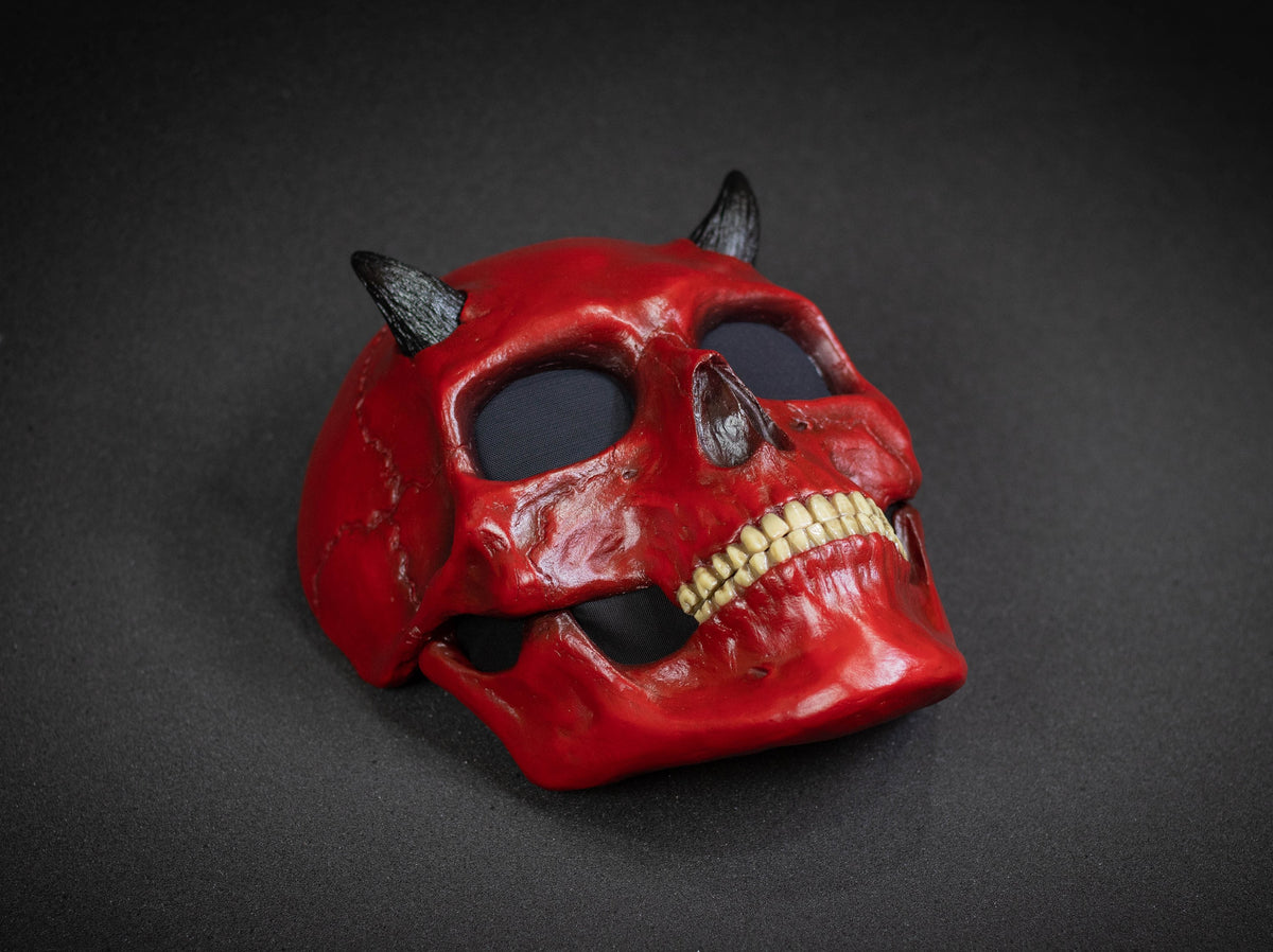 Human Skull mask with small black horns and red shape