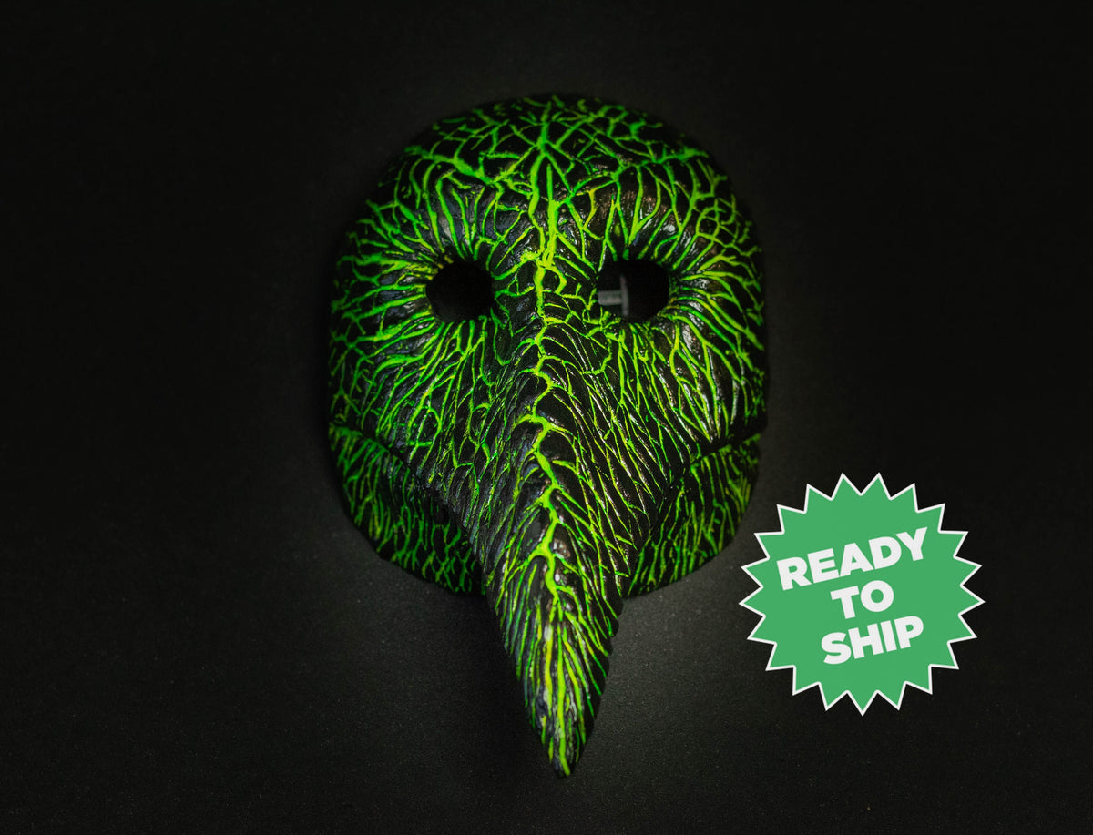 Plague Doctor mask for Helloween party and carnival or masquerade. Predator blood acid streaks shape.