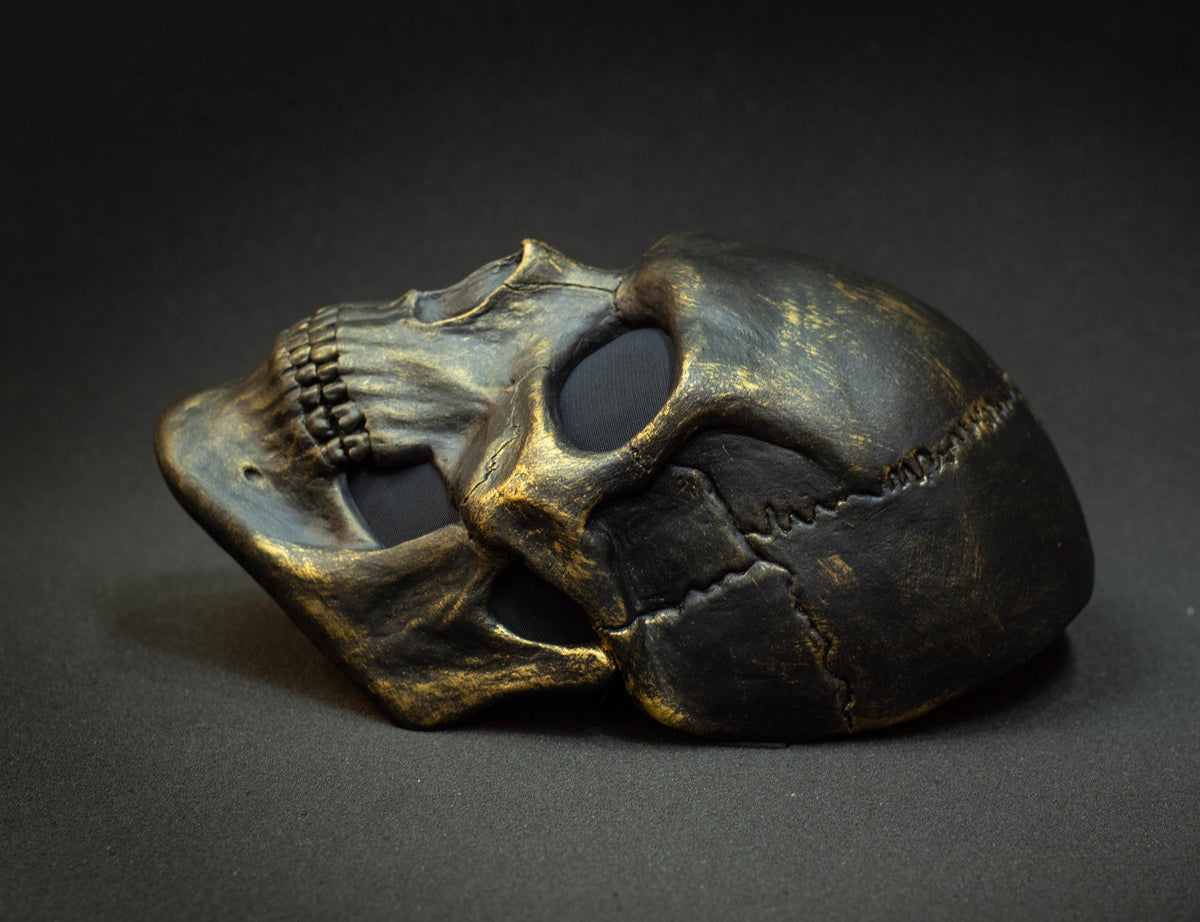 Black skull mask with gold scuffs for cosplay or gift