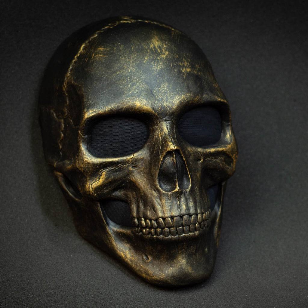 Black skull mask with gold scuffs for cosplay or gift