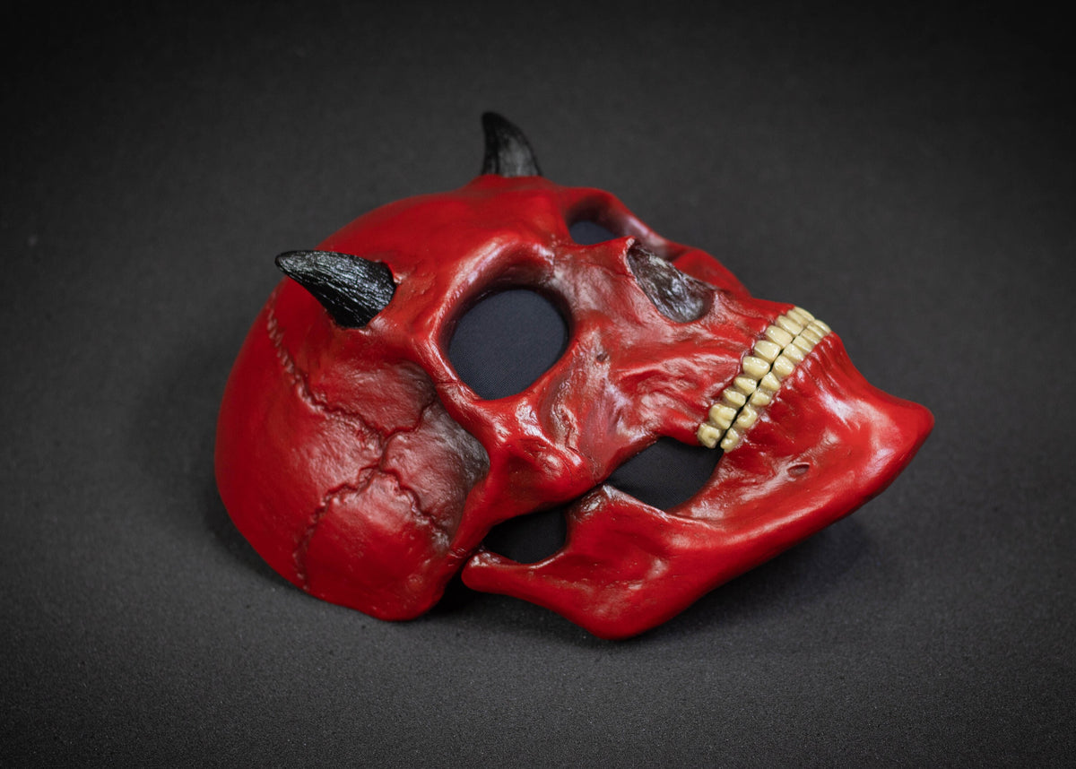 Human Skull mask with small black horns and red shape