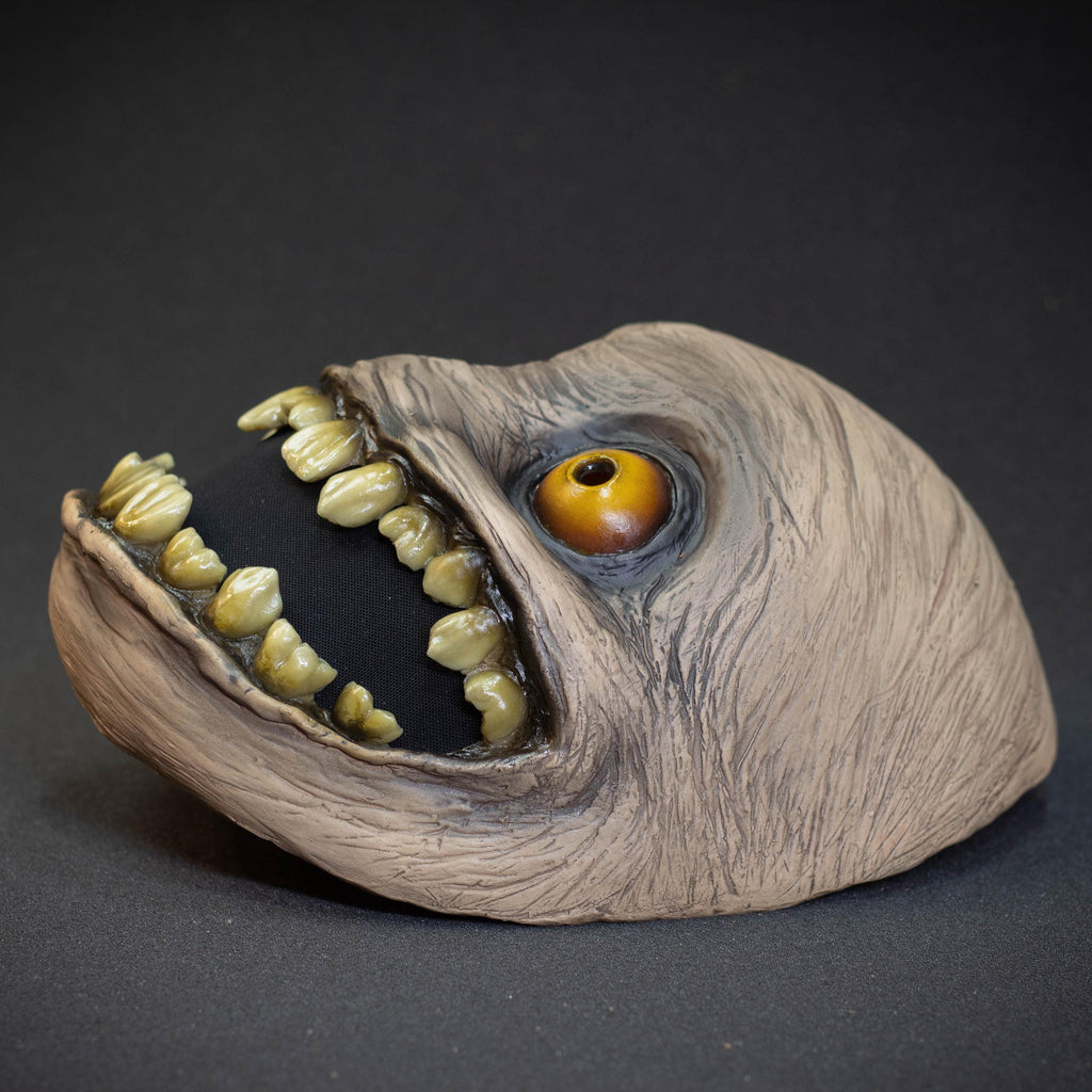 Crazy smile mask with yellow eyes for Halloween or a funny gift