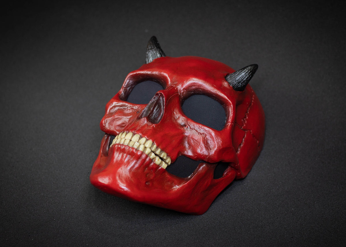 Human Skull mask with small black horns and red shape