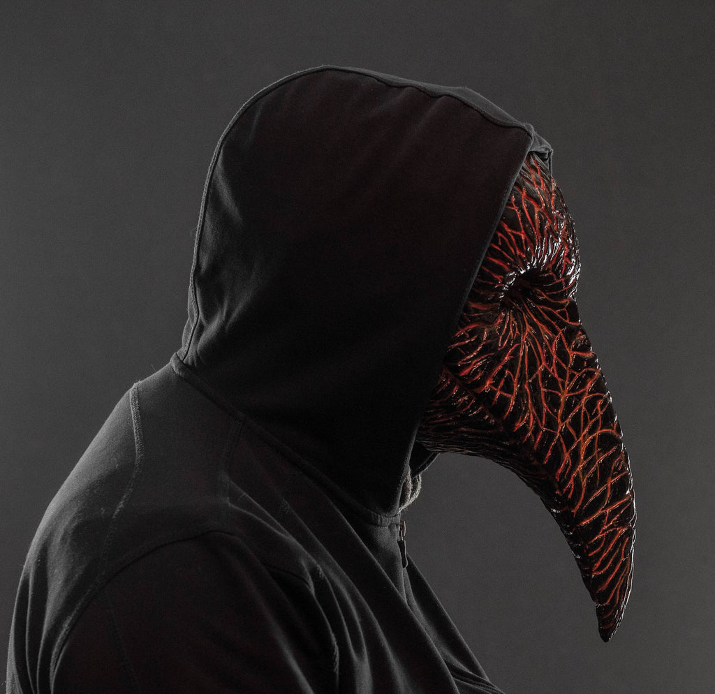 Plague Doctor mask for Helloween party and carnival or masquerade. Bird mask magma shape.