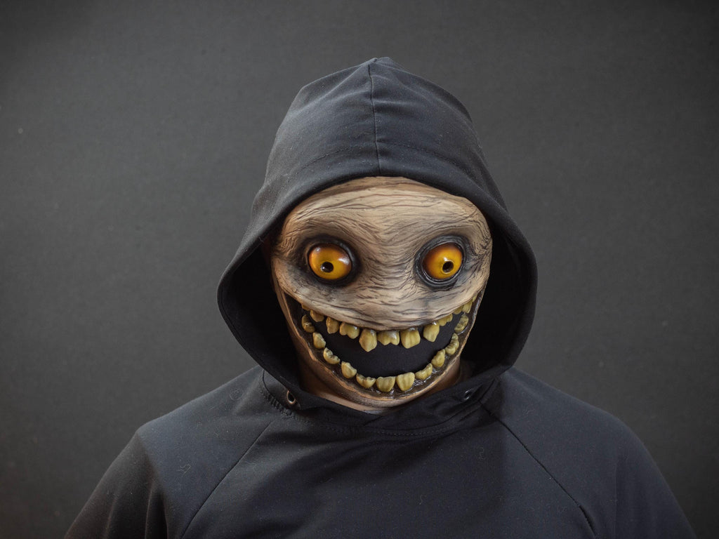 Crazy smile mask with yellow eyes for Halloween or a funny gift