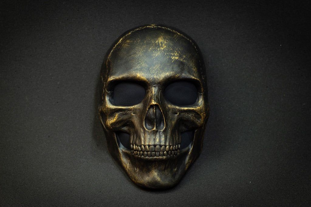 Black skull mask with gold scuffs for cosplay or gift