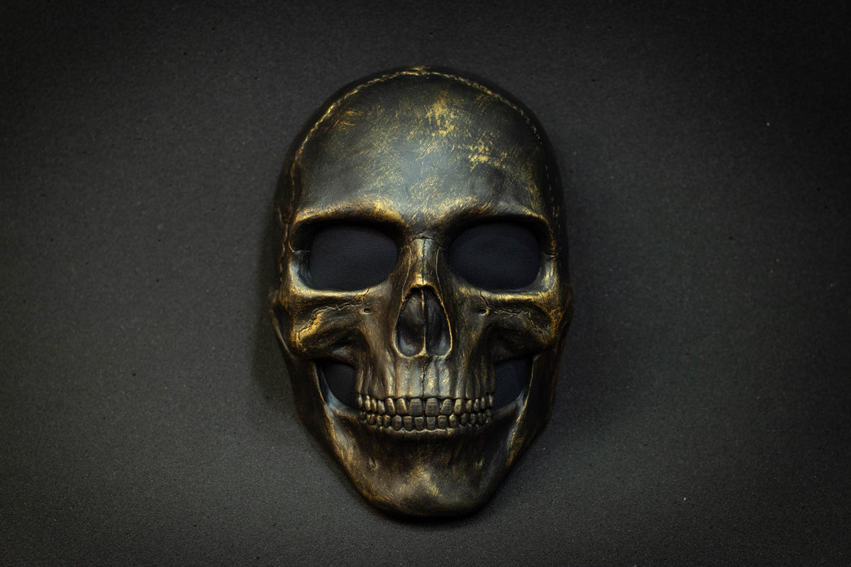 Black skull mask with gold scuffs for cosplay or gift