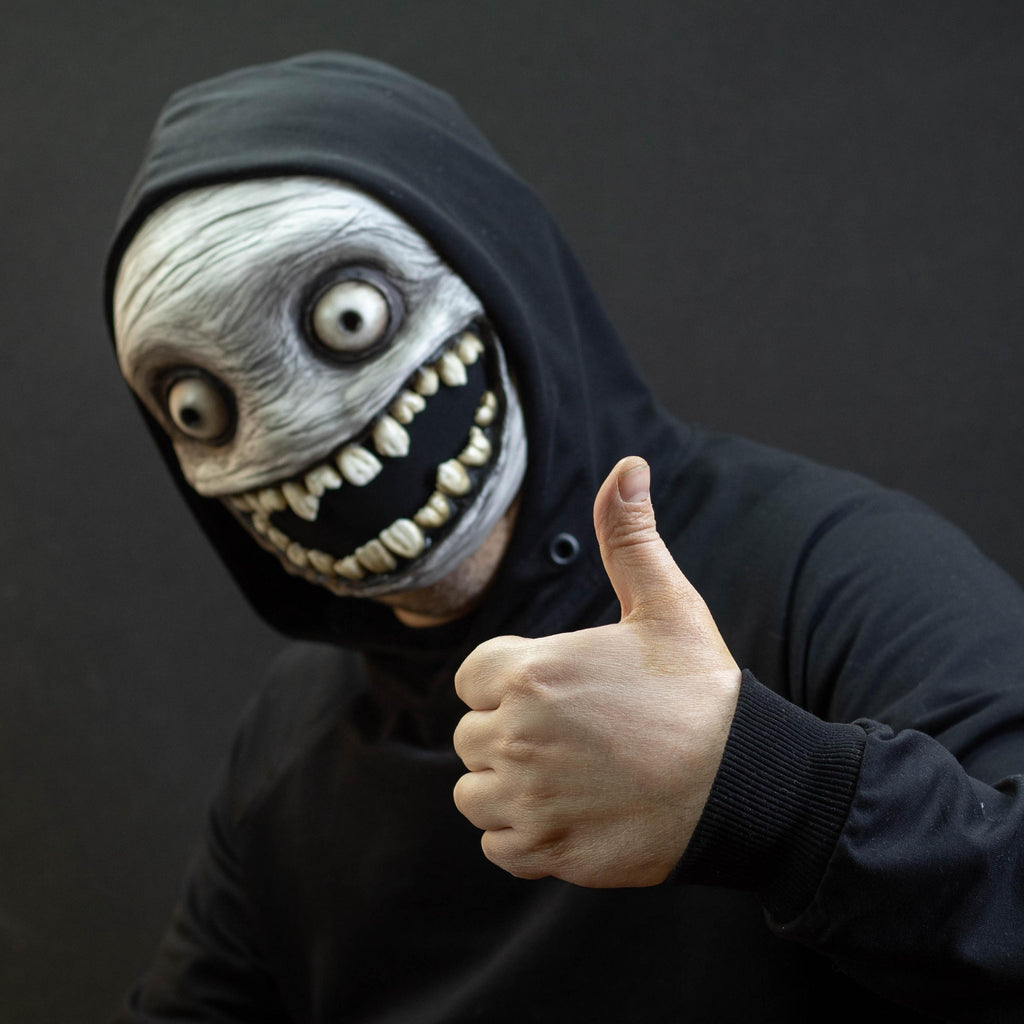 Crazy smile mask with bulging eyes for Halloween or a funny gift