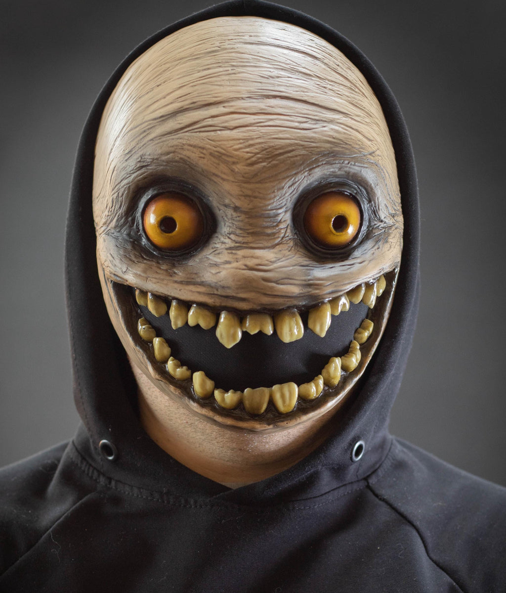 Crazy smile mask with yellow eyes for Halloween or a funny gift