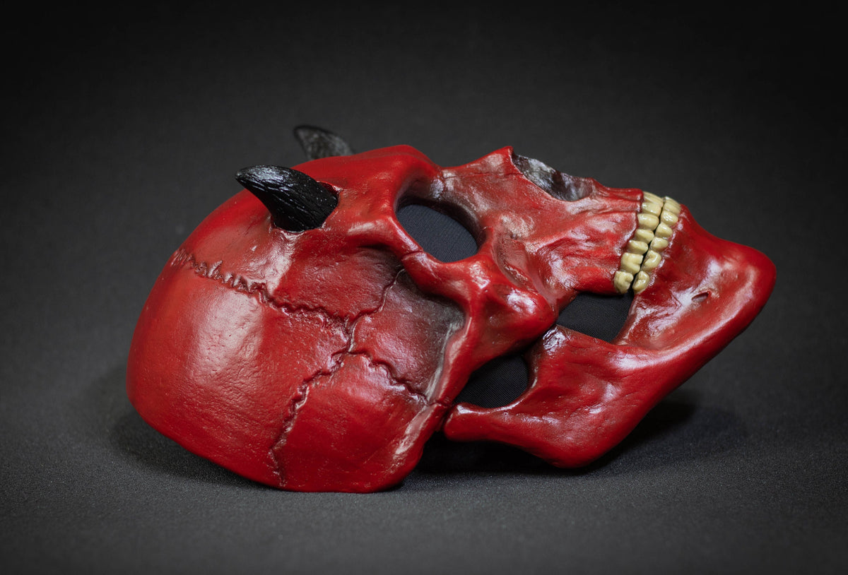 Human Skull mask with small black horns and red shape