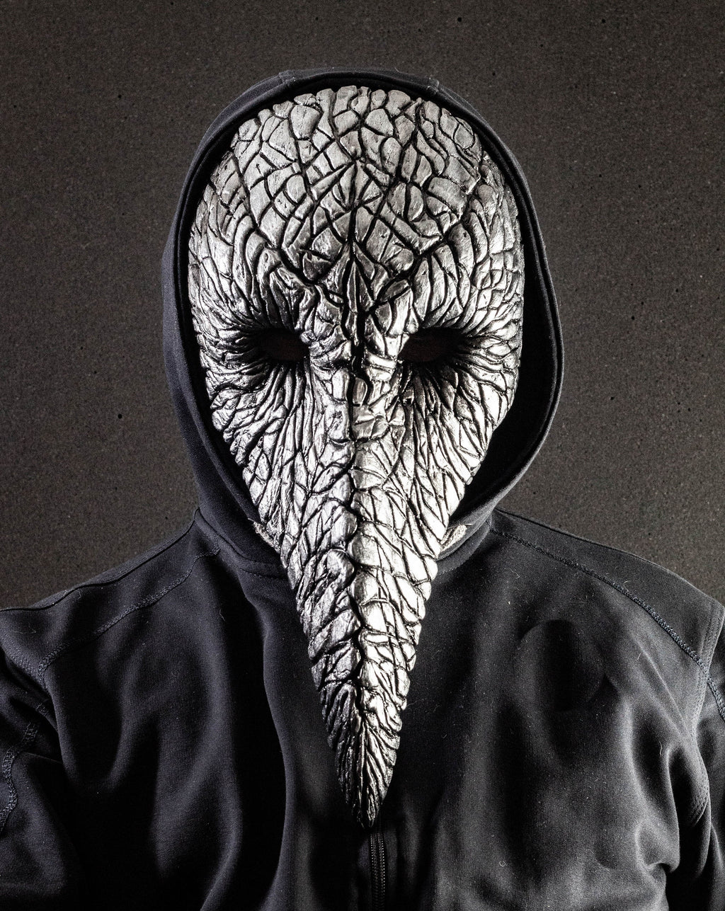 Plague Doctor mask for Helloween party and carnival or masquerade. Bird mask metallic shape.