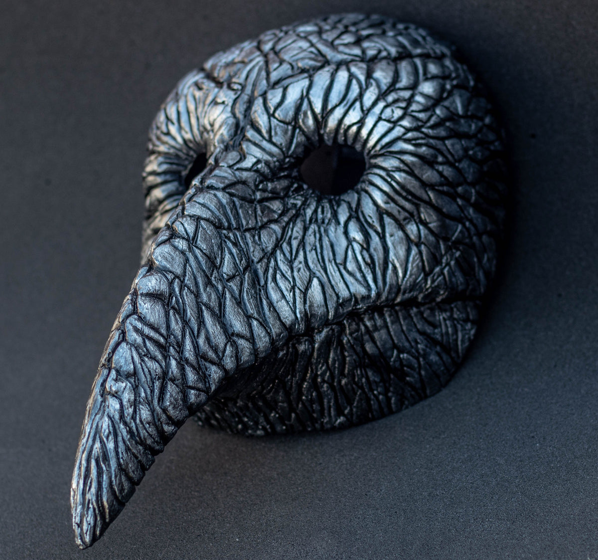 Plague Doctor mask for Helloween party and carnival or masquerade. Bird mask metallic shape.