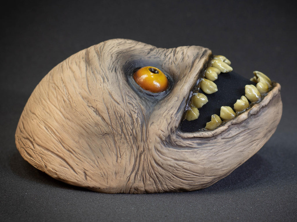 Crazy smile mask with yellow eyes for Halloween or a funny gift
