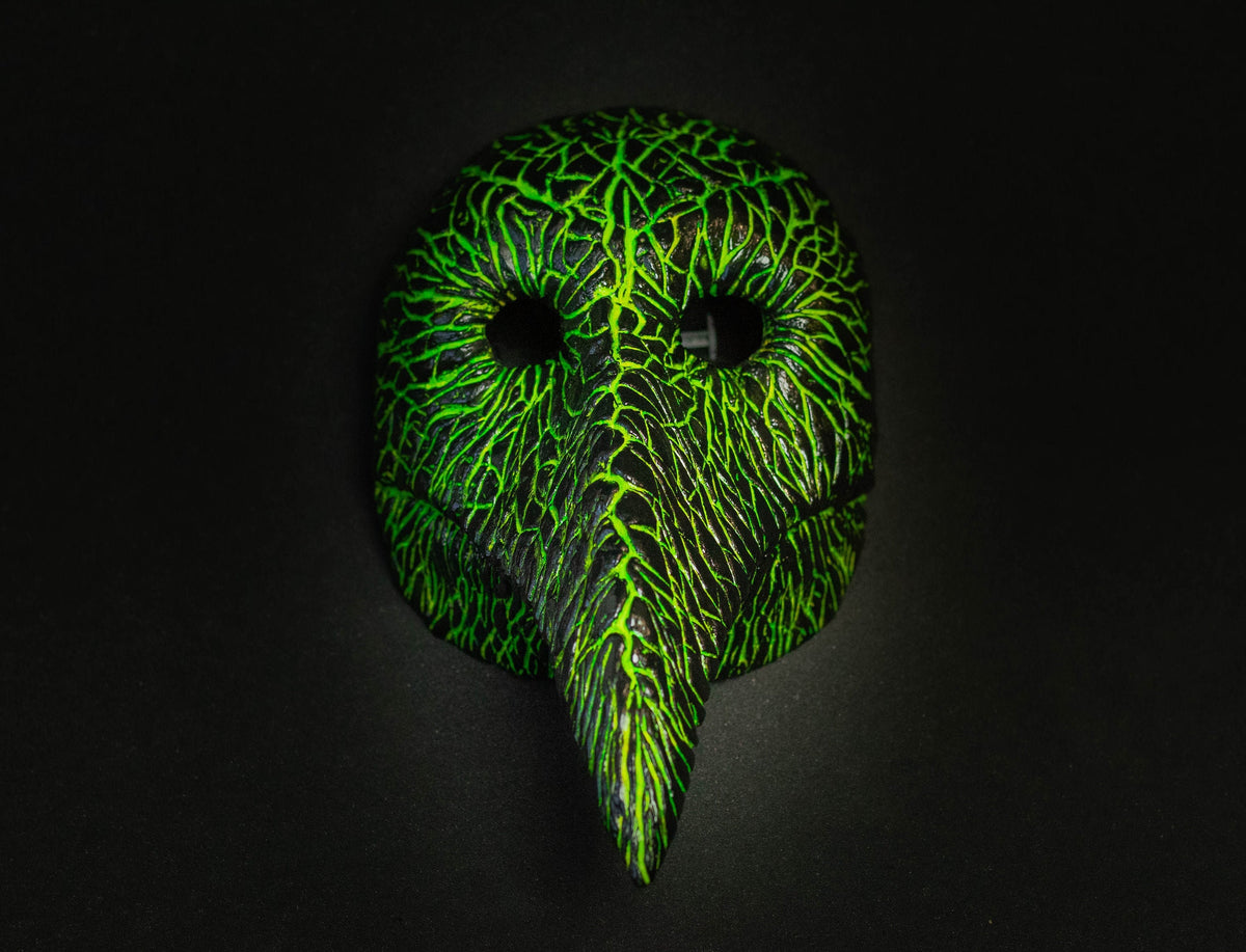 Plague Doctor mask for Helloween party and carnival or masquerade. Predator blood acid streaks shape.