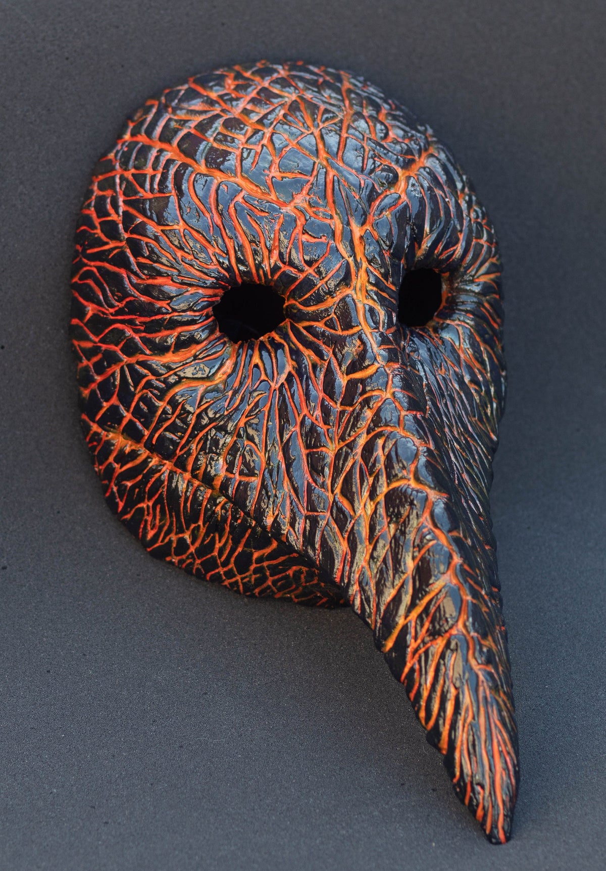 Plague Doctor mask for Helloween party and carnival or masquerade. Bird mask magma shape.