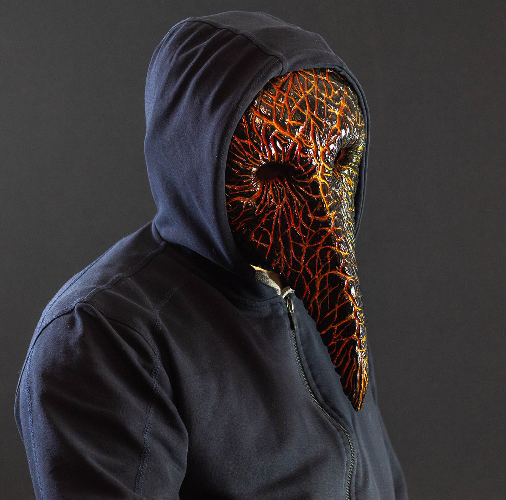 Plague Doctor mask for Helloween party and carnival or masquerade. Bird mask magma shape.